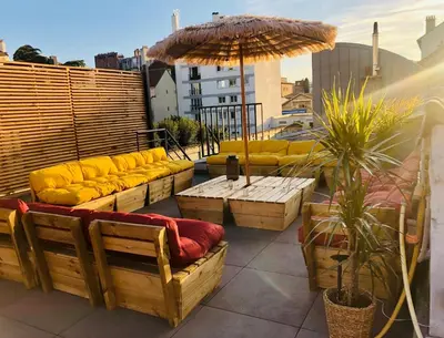 Coin salon dans l'établissement LOFT Triplex 300m² à 10 min PARIS/EXPO