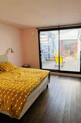 Un ou plusieurs lits dans un hébergement de l'établissement LOFT Triplex 300m² à 10 min PARIS/EXPO