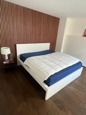 Un ou plusieurs lits dans un hébergement de l'établissement LOFT Triplex 300m² à 10 min PARIS/EXPO