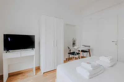 Un ou plusieurs lits dans un hébergement de l'établissement Joli studio pour 2 personnes - Levallois-Perret