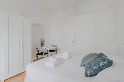 Un ou plusieurs lits dans un hébergement de l'établissement Joli studio pour 2 personnes - Levallois-Perret
