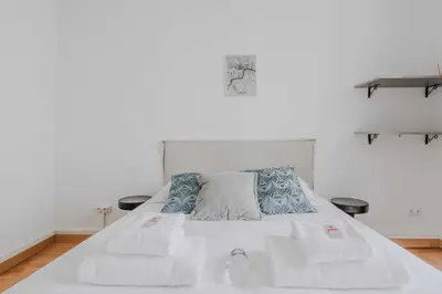Un ou plusieurs lits dans un hébergement de l'établissement Joli studio pour 2 personnes - Levallois-Perret
