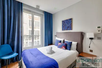 Un ou plusieurs lits dans un hébergement de l'établissement Urban Flat 75 - Sublime 3BDR Flat near Les Jardins du Luxembourg