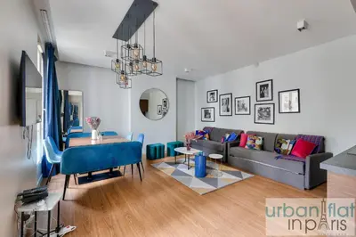 Coin salon dans l'établissement Urban Flat 75 - Sublime 3BDR Flat near Les Jardins du Luxembourg
