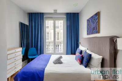 Un ou plusieurs lits dans un hébergement de l'établissement Urban Flat 75 - Sublime 3BDR Flat near Les Jardins du Luxembourg