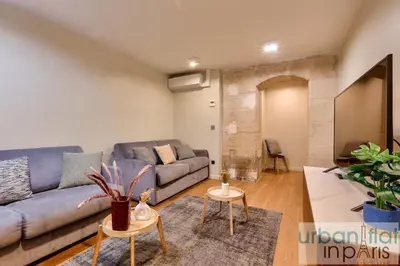 Coin salon dans l'établissement Urban Flat 77 - Sublime and Spacious Flat in Le Marais