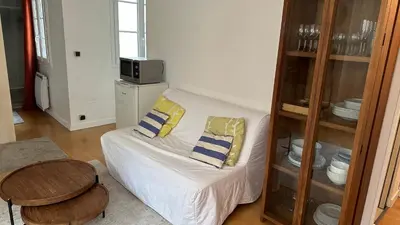 Un ou plusieurs lits dans un hébergement de l'établissement Haut-Marais Joli appartement.