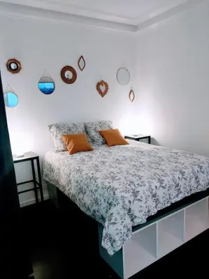 Un ou plusieurs lits dans un hébergement de l'établissement Appartement les Abbesses
