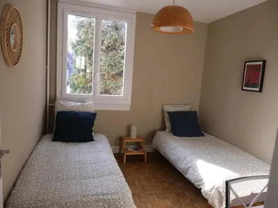 Un ou plusieurs lits dans un hébergement de l'établissement Appartement de designer, Grand Paris pour 6 personnes, Metro 14