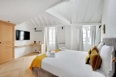 Un ou plusieurs lits dans un hébergement de l'établissement Pick A Flat's Apartement in Saint-Germain-des-Prés - Rue de Seine