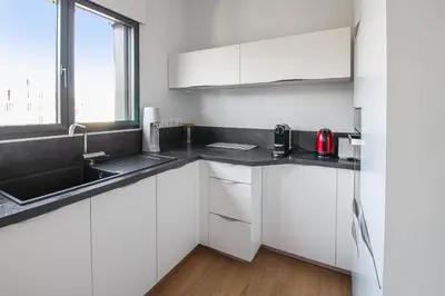 Cuisine ou kitchenette dans l'établissement La terrasse d'Issy - Welkeys