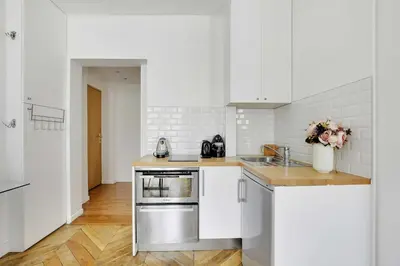 Cuisine ou kitchenette dans l'établissement Authentic apartment - 1BR-2P - Palais Garnier
