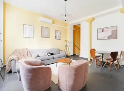 Coin salon dans l'établissement Duplex Charme Bastille - 8P - Confort Premium