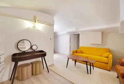 Coin salon dans l'établissement Duplex Charme Bastille - 8P - Confort Premium