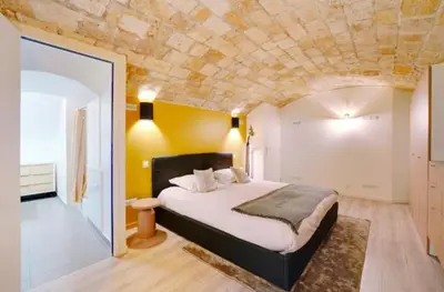 Un ou plusieurs lits dans un hébergement de l'établissement Duplex Charme Bastille - 8P - Confort Premium