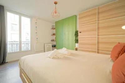 Un ou plusieurs lits dans un hébergement de l'établissement Soleil Vert - Ravissant cocon moderne - proche Stade de France