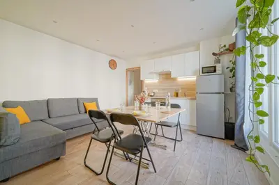Cuisine ou kitchenette dans l'établissement Soleil Vert - Ravissant cocon moderne - proche Stade de France