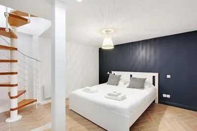 Un ou plusieurs lits dans un hébergement de l'établissement Modern apt-1BR-4P-Atelier des lumières museum