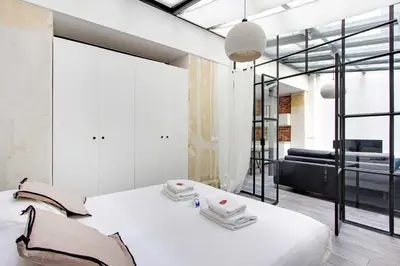 Un ou plusieurs lits dans un hébergement de l'établissement Splendid apartment - 2BR 4P - Sacré-Cœur