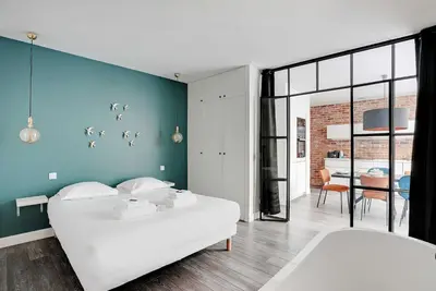 Un ou plusieurs lits dans un hébergement de l'établissement Splendid apartment - 2BR 4P - Sacré-Cœur
