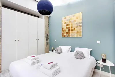 Un ou plusieurs lits dans un hébergement de l'établissement Luminous apartment 4P2BD Sacré-Coeur Montmartre - G