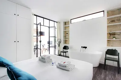 Un ou plusieurs lits dans un hébergement de l'établissement Luminous apartment 4P2BD Sacré-Coeur Montmartre - G