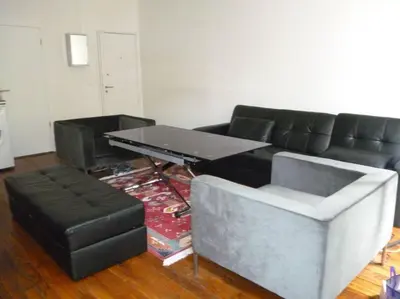Coin salon dans l'établissement Beautiful 4 people flat in Paris, Bastille