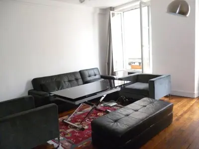 Coin salon dans l'établissement Beautiful 4 people flat in Paris, Bastille