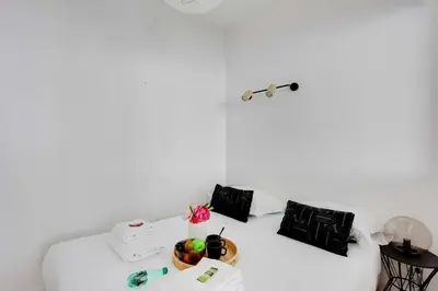 Un ou plusieurs lits dans un hébergement de l'établissement Accueillant et moderne - 2BR 4P - Sacré Coeur