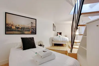 Un ou plusieurs lits dans un hébergement de l'établissement Accueillant et moderne - 2BR 4P - Sacré Coeur