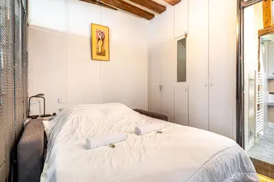 Un ou plusieurs lits dans un hébergement de l'établissement GuestReady - Stone wall stay near Sainte-Chapelle
