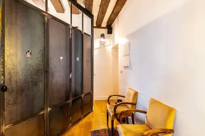 Coin salon dans l'établissement GuestReady - Stone wall stay near Sainte-Chapelle