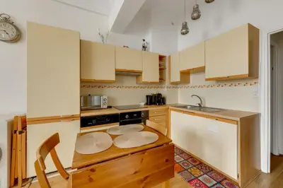 Cuisine ou kitchenette dans l'établissement Cocon chaleureux aux portes de Paris