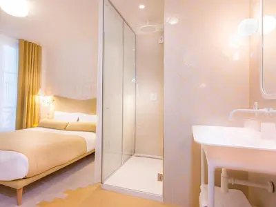 Un ou plusieurs lits dans un hébergement de l'établissement Hotel le Lapin Blanc