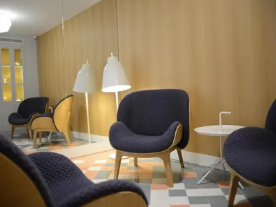 Coin salon dans l'établissement Hotel le Lapin Blanc