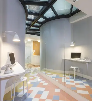 Télévision ou salle de divertissement dans l'établissement Hotel le Lapin Blanc
