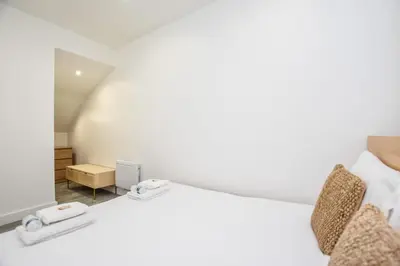 Un ou plusieurs lits dans un hébergement de l'établissement Cosy apartment - 1BR-4P - Auteuil