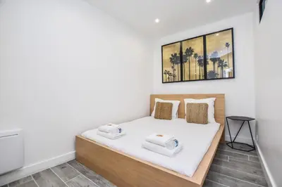 Un ou plusieurs lits dans un hébergement de l'établissement Cosy apartment - 1BR-4P - Auteuil