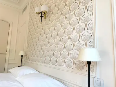 Un ou plusieurs lits dans un hébergement de l'établissement La Villa Paris - B&B