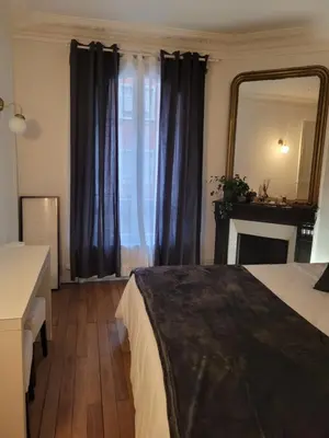 Un ou plusieurs lits dans un hébergement de l'établissement L'appartement Idéal 4 voyageurs