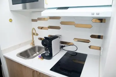 Cuisine ou kitchenette dans l'établissement Paris' Premium Romantic Studio