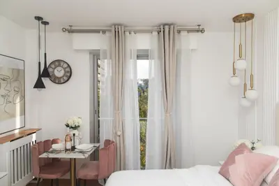 Un ou plusieurs lits dans un hébergement de l'établissement Paris' Premium Romantic Studio