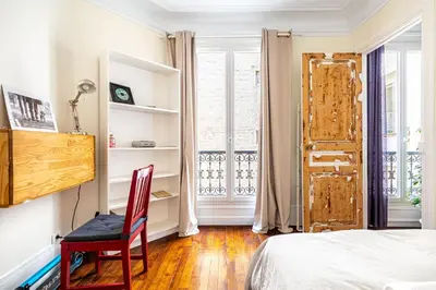 Un ou plusieurs lits dans un hébergement de l'établissement GuestReady - Estadia maravilhosa perto do Père-Lachaise
