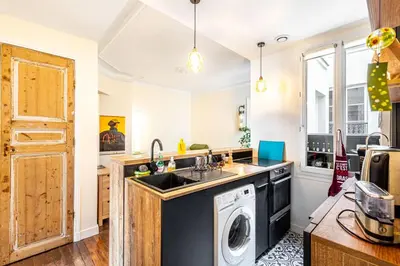 Cuisine ou kitchenette dans l'établissement GuestReady - Estadia maravilhosa perto do Père-Lachaise