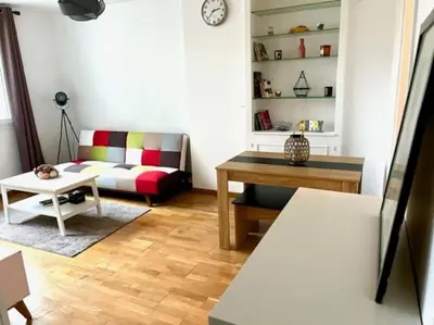 Coin salon dans l'établissement Charmant appartement 3 pièces