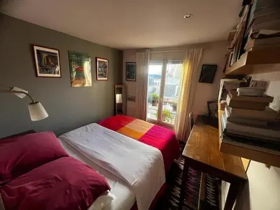 Un ou plusieurs lits dans un hébergement de l'établissement Appartement - Belle vue - Marais