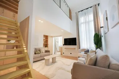 Télévision ou salle de divertissement dans l'établissement Elegant apartment - 2BR-6P - Palais Royal
