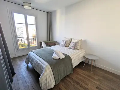 Un ou plusieurs lits dans un hébergement de l'établissement Cosy little nest next to Paris
