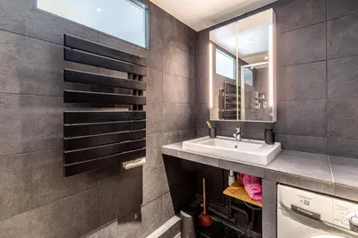 Salle de bains dans l'établissement GuestReady - Séjour confortable dans le 9ème