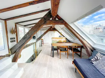 Coin salon dans l'établissement Penthouse with Terrasse and view on Eiffel tower